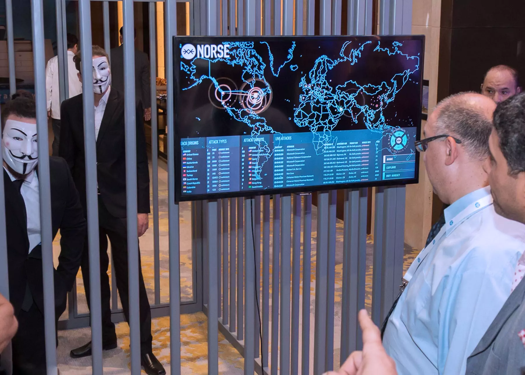 Attendees looking at the gorilla marketing display at the HP event