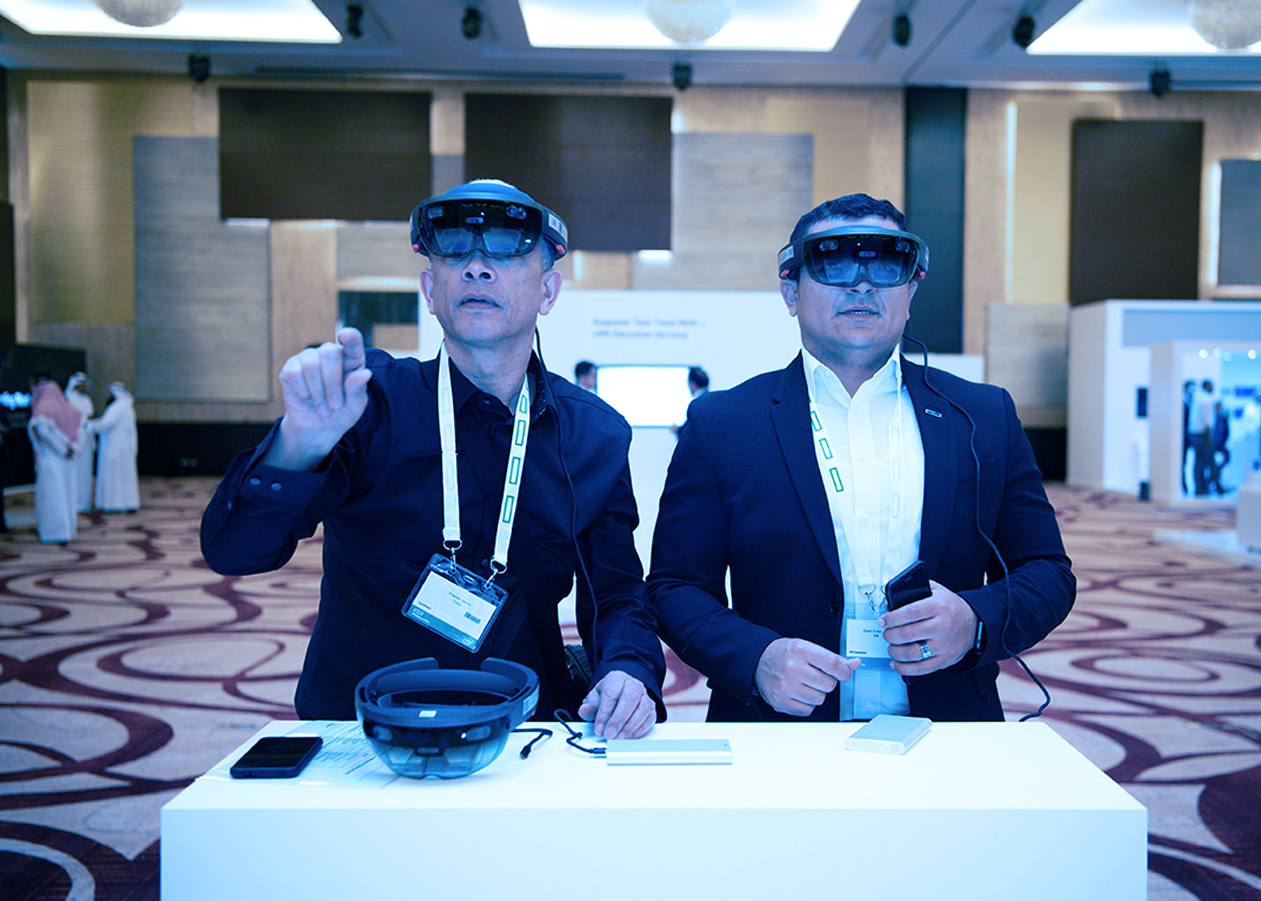 Two men using the immersive VR headset