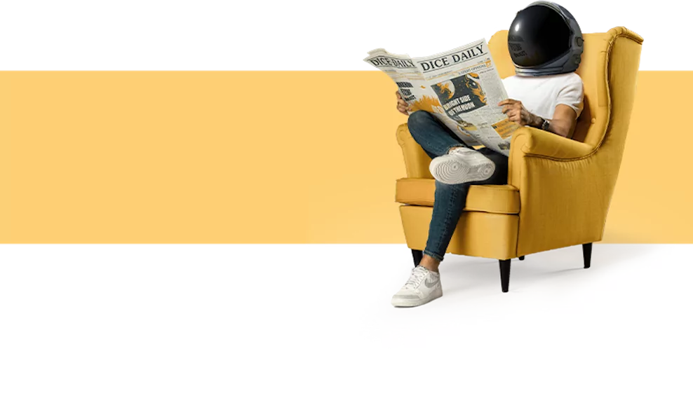 Man sitting reading a newspaper