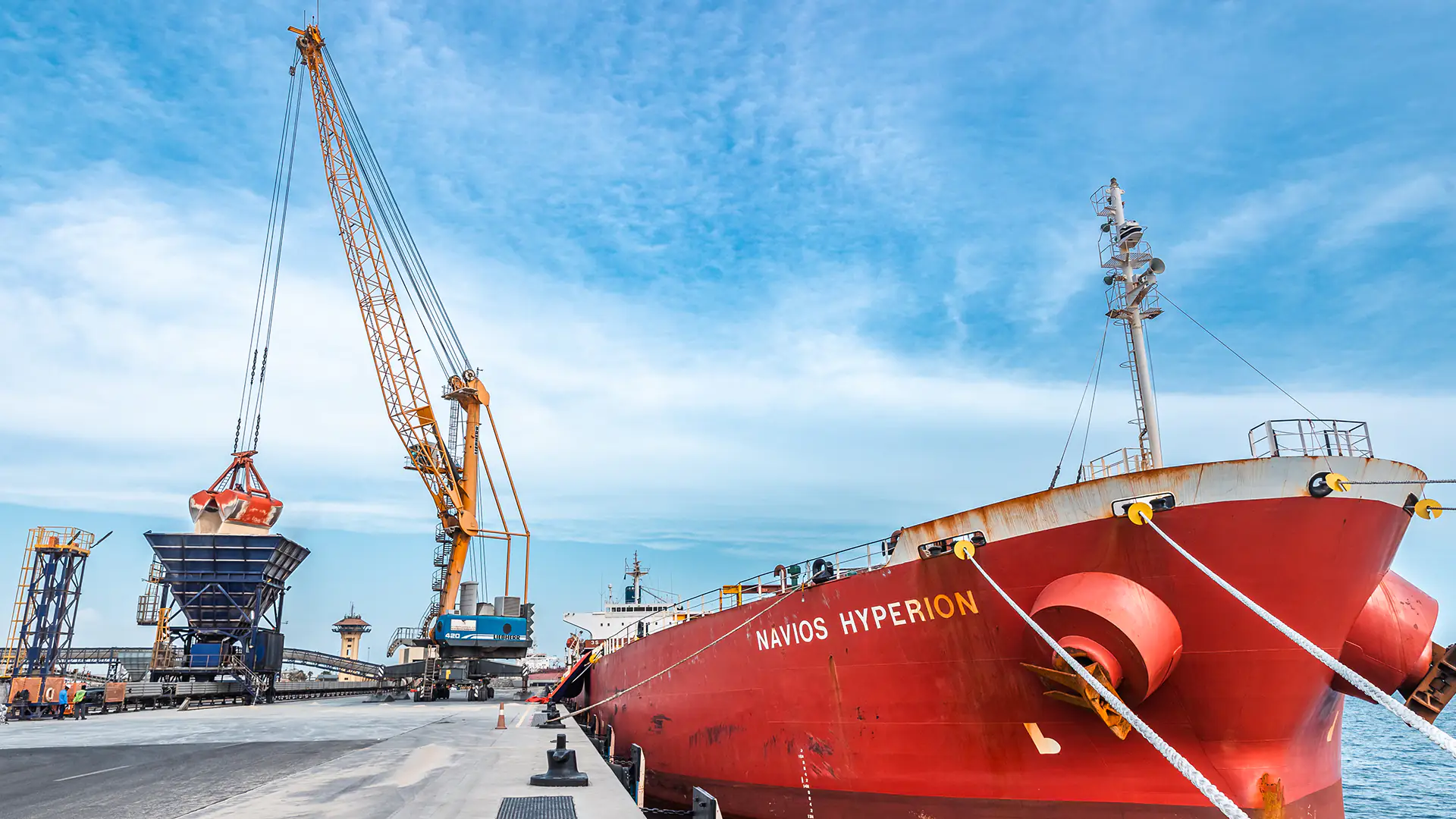 Boat on water and crane on land