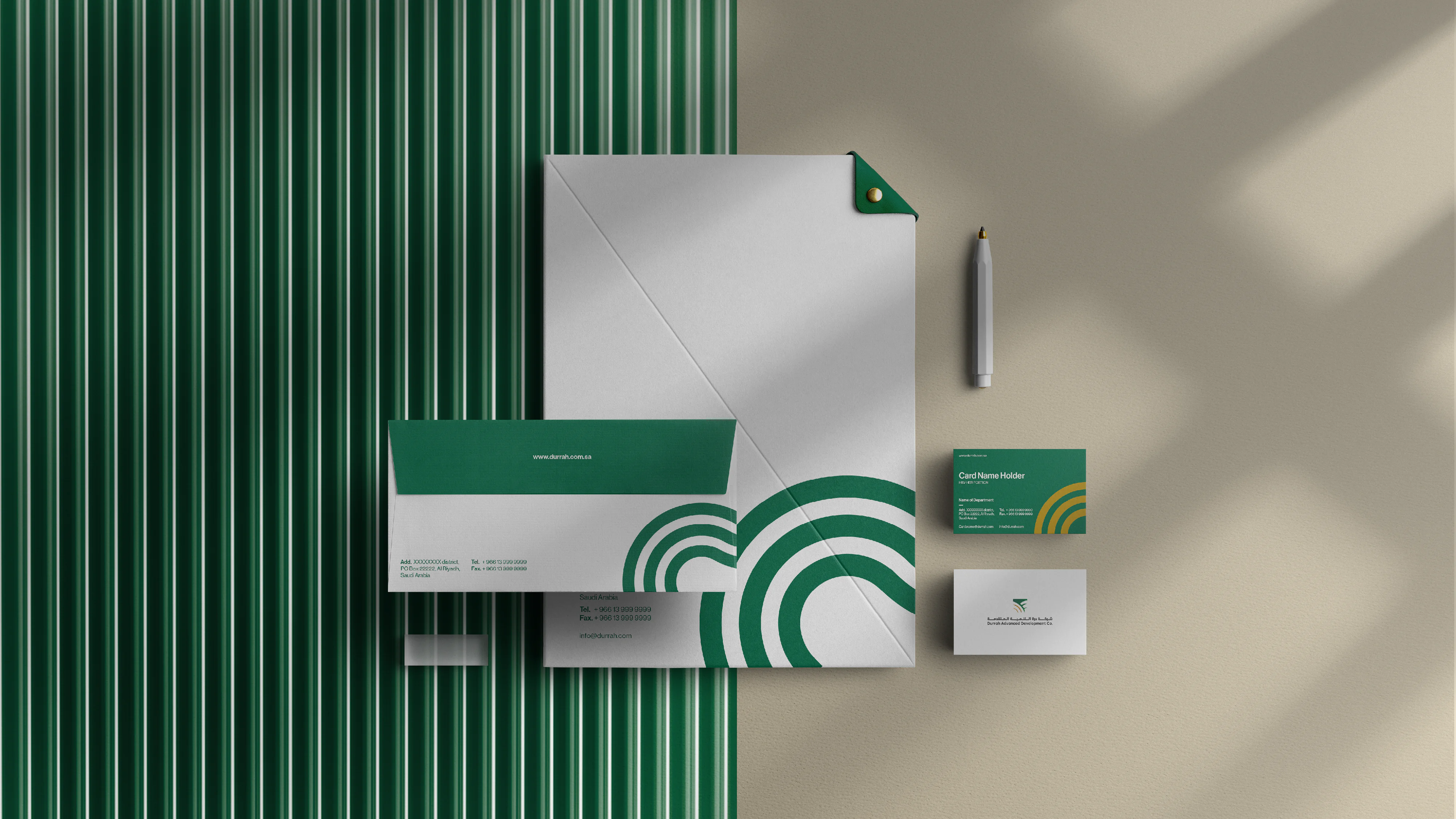 Branding materials for Durrah Sugar, including letterhead, envelope, business cards, and pen with green and white color scheme.