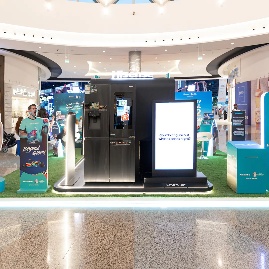 Hisense smart refrigerator display with an interactive screen in a mall, promoting the brand's partnership with UEFA Euro 2024