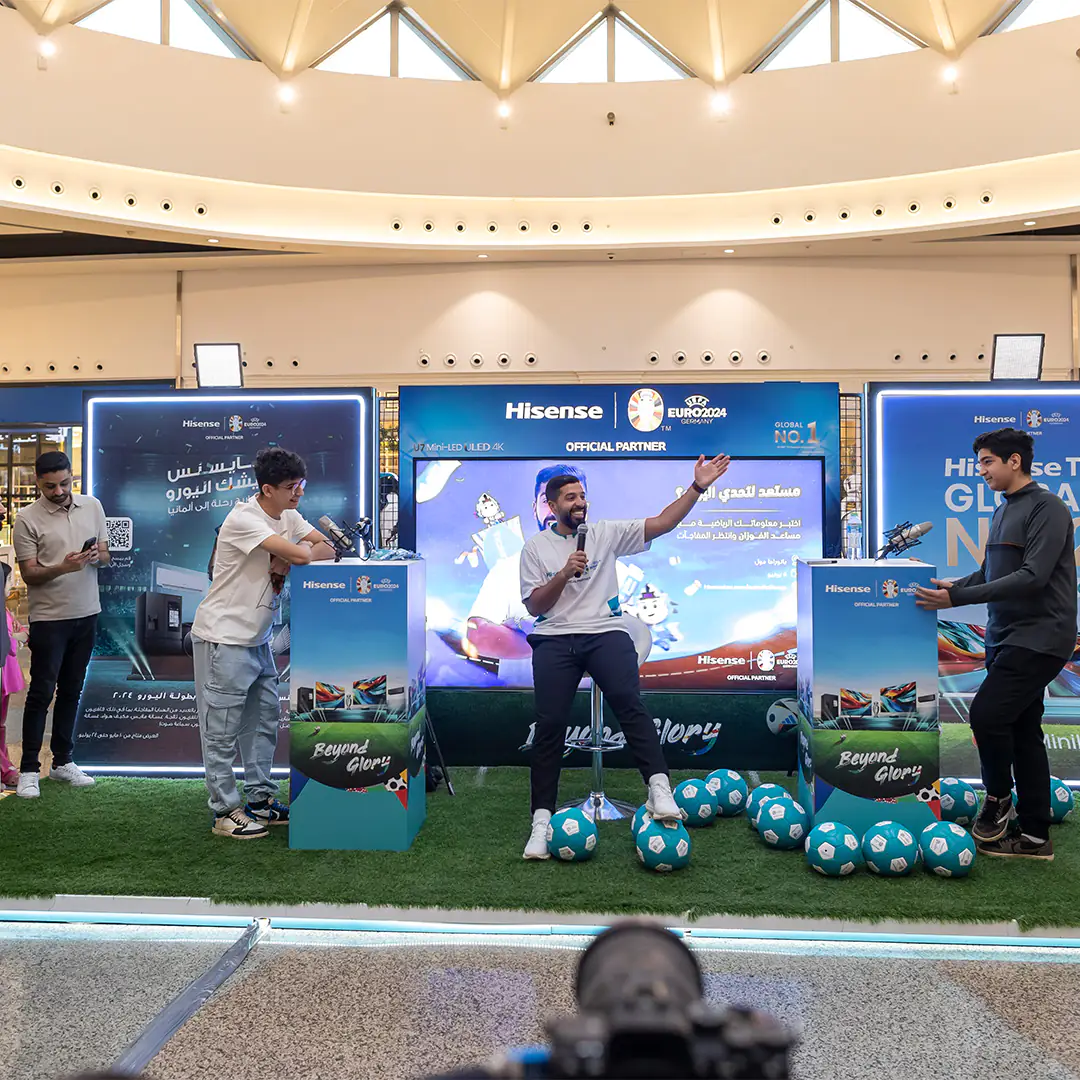 Influencer Mosaad Al Fozan engaging with the audience at the Hisense booth promoting the UEFA Euro 2024 partnership