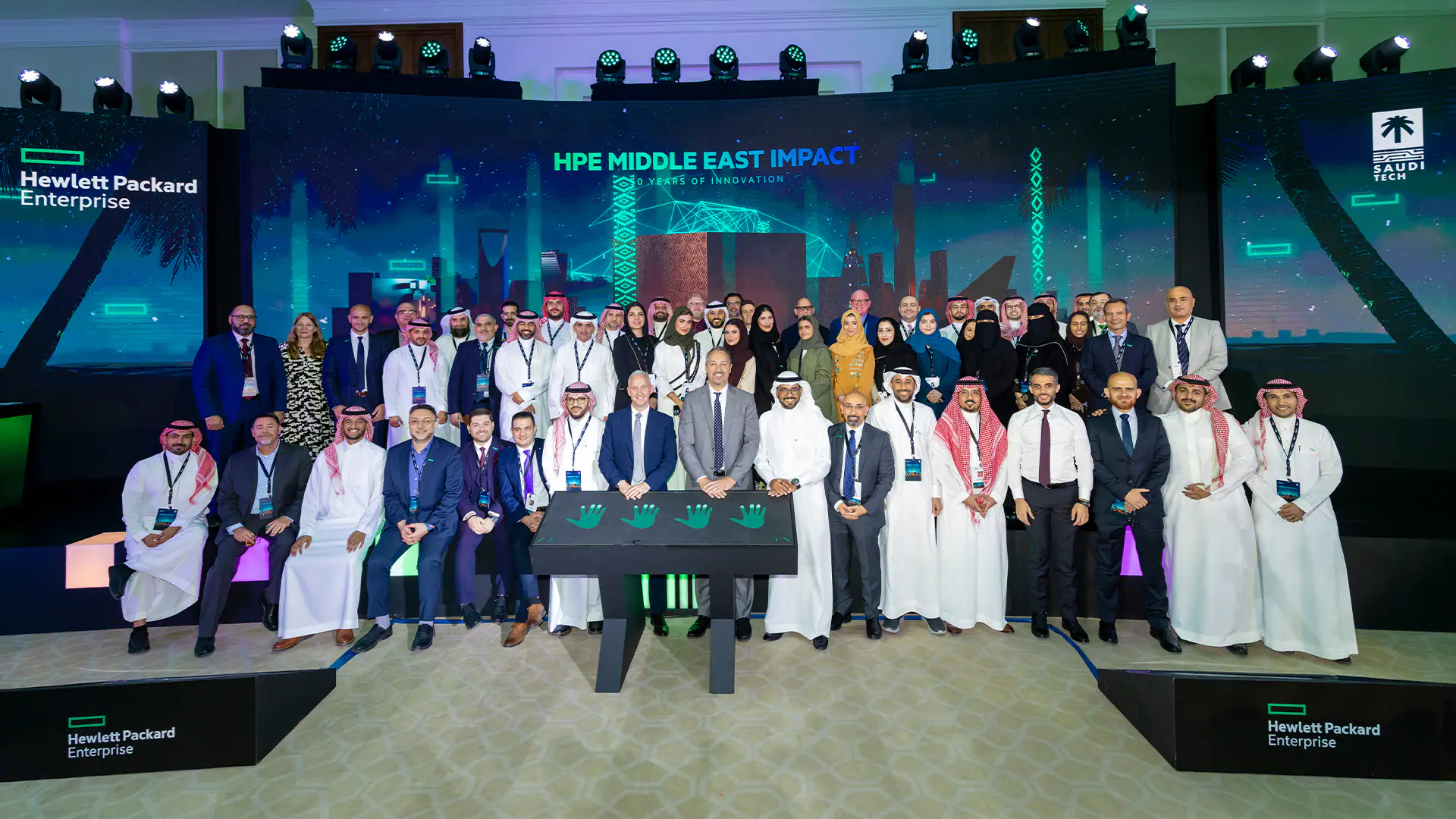 HPE team celebrating the success of the Middle East Impact event, marking 50 years of innovation and achievements