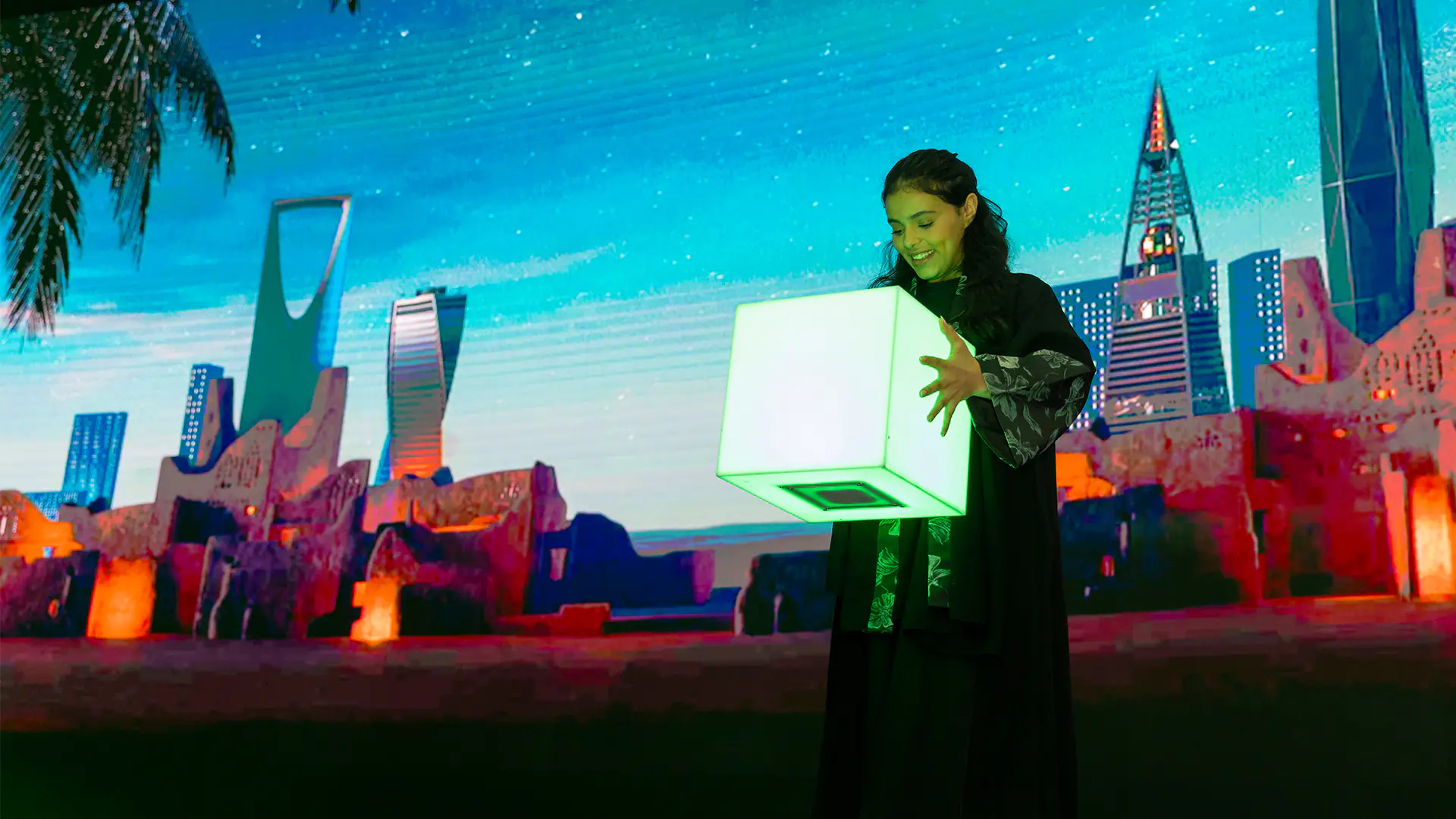 Performer introducing 50 years of innovation during the HPE Middle East Impact event, blending tech and Saudi heritage