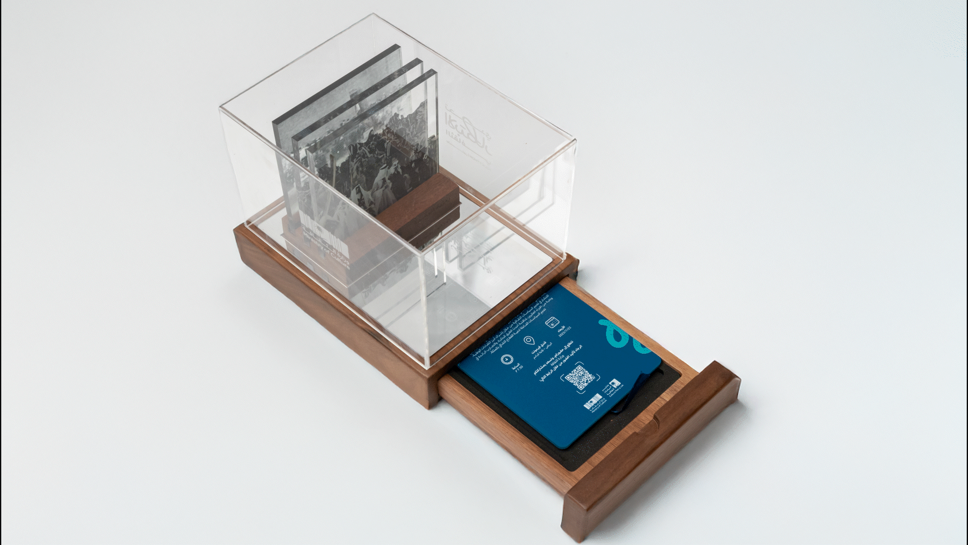 Premium Policython invitation box with sliding drawer, showcasing layered cultural panels and event access details.