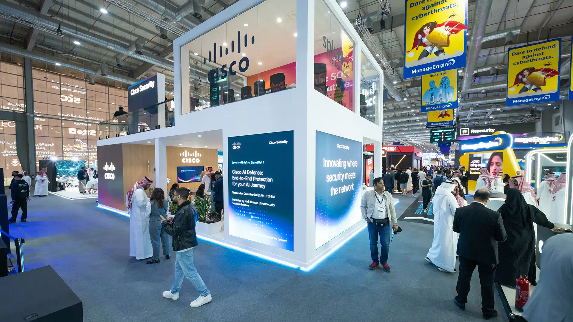 Cisco booth corner with large branding panels and upper-level meeting rooms visible at Black Hat 2025.