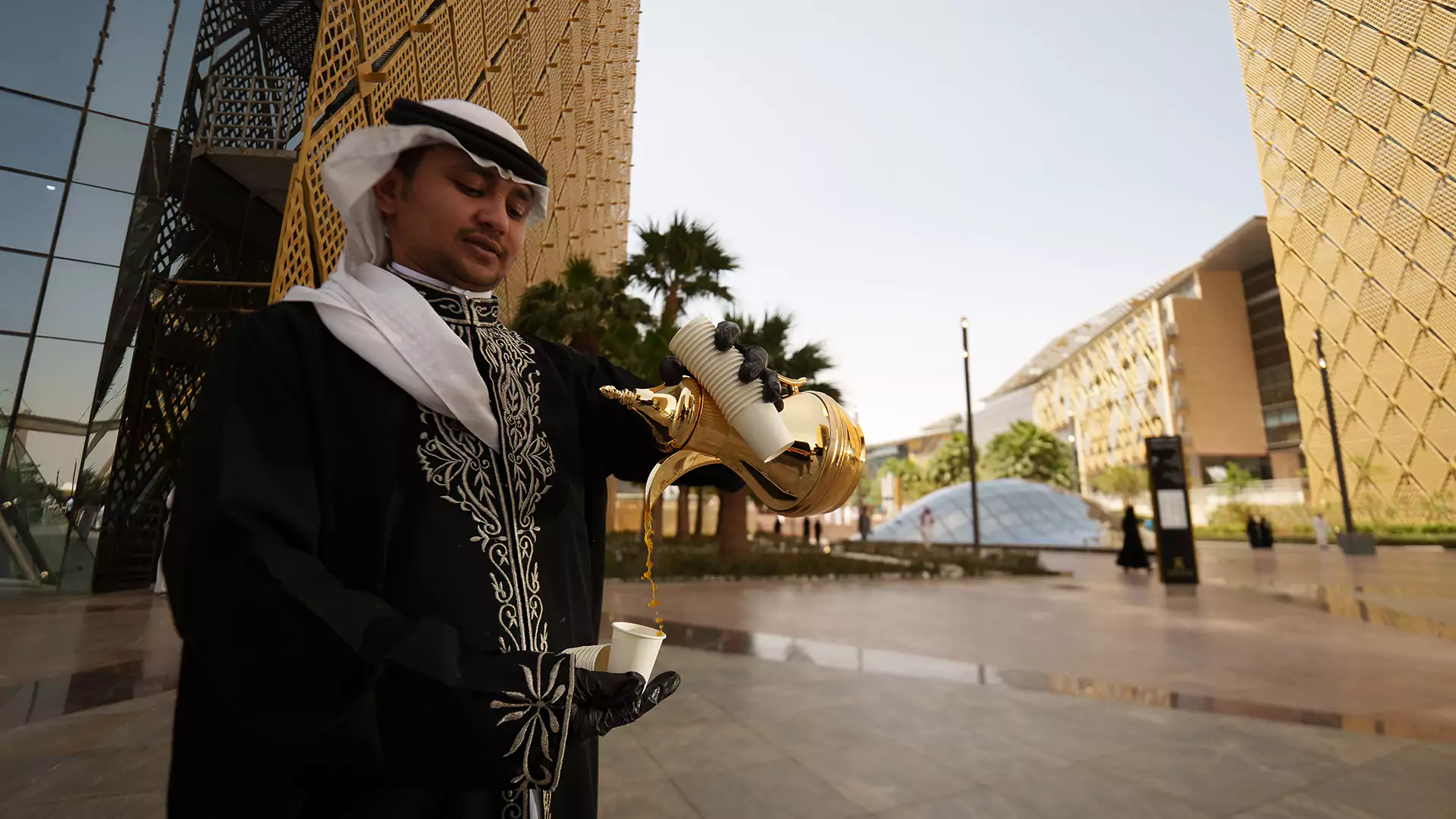Saudi coffee being poured during Eid cultural experience at Digital City