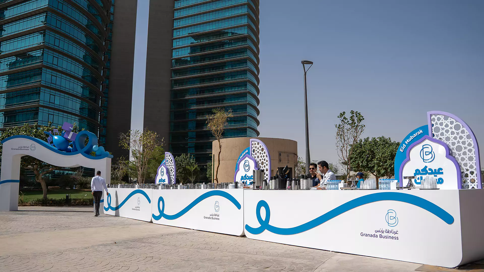 Eid hospitality station with drinks and branded Granada Business setup